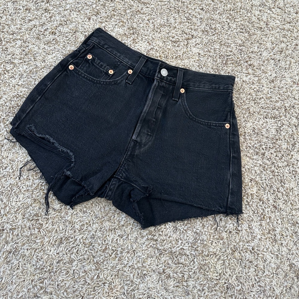 Levi’s shorts. Black. Never worn. Size 24 waist.